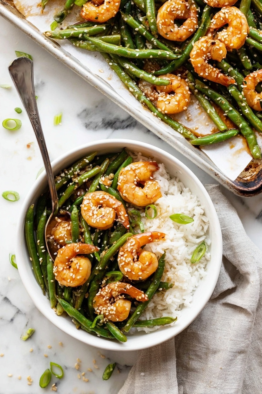 A white bowl filled with a base layer of white rice, topped with bright green cooked green beans arranged mostly in the center. On top of the green beans are medium-sized cooked shrimp, orange in color with a glossy sauce coating. The shrimp and green beans are sprinkled with white sesame seeds and small pieces of chopped green onions. A silver fork is placed inside the bowl, resting on the rice and green beans. The bowl is set on a soft gray cloth, all on a white marbled surface. Photo taken with an iphone --ar 2:3 --v 7